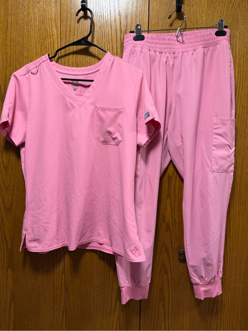 Med Couture Pink Women's Two-Piece Scrub Set.